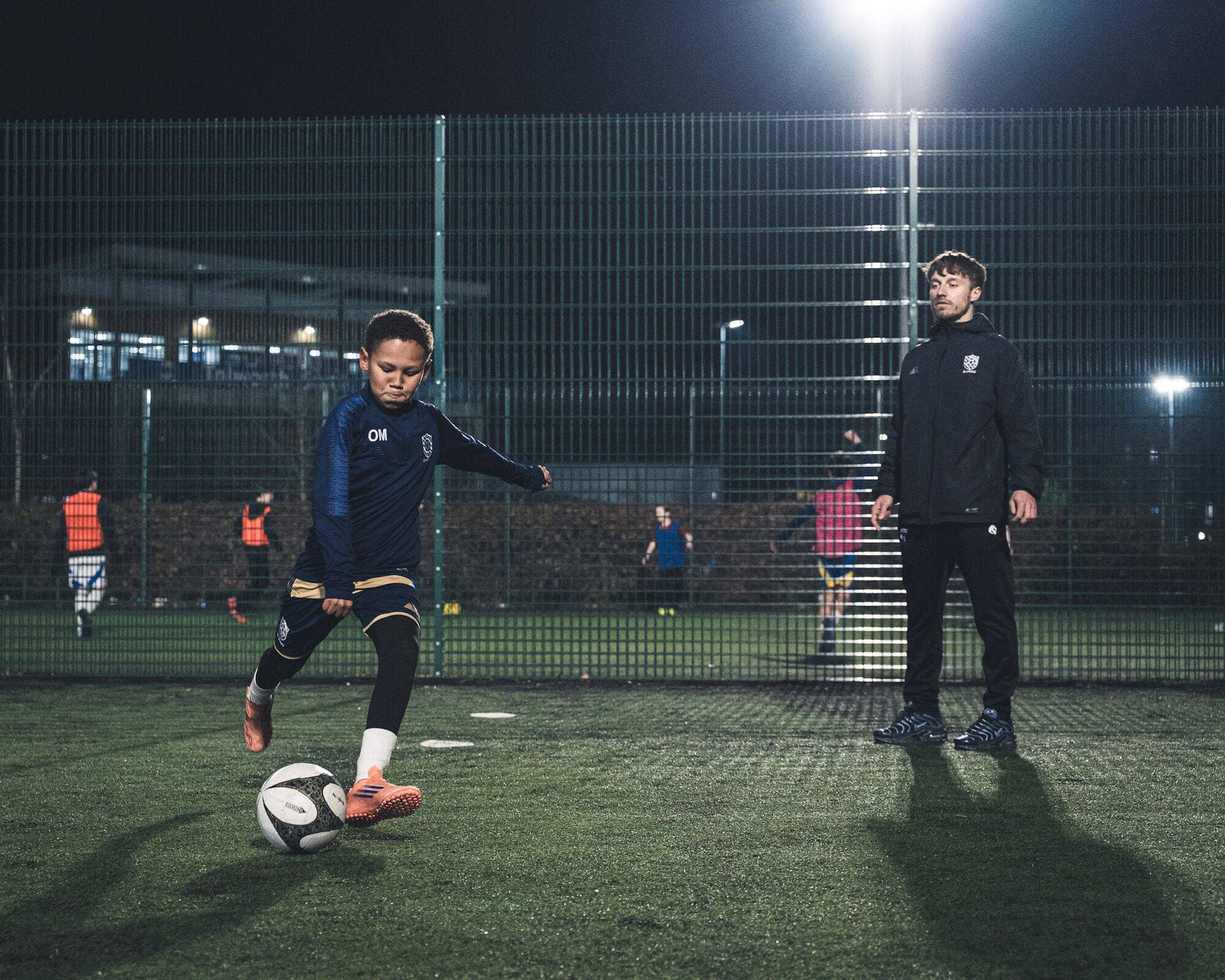 E-PPRO players training under floodlights