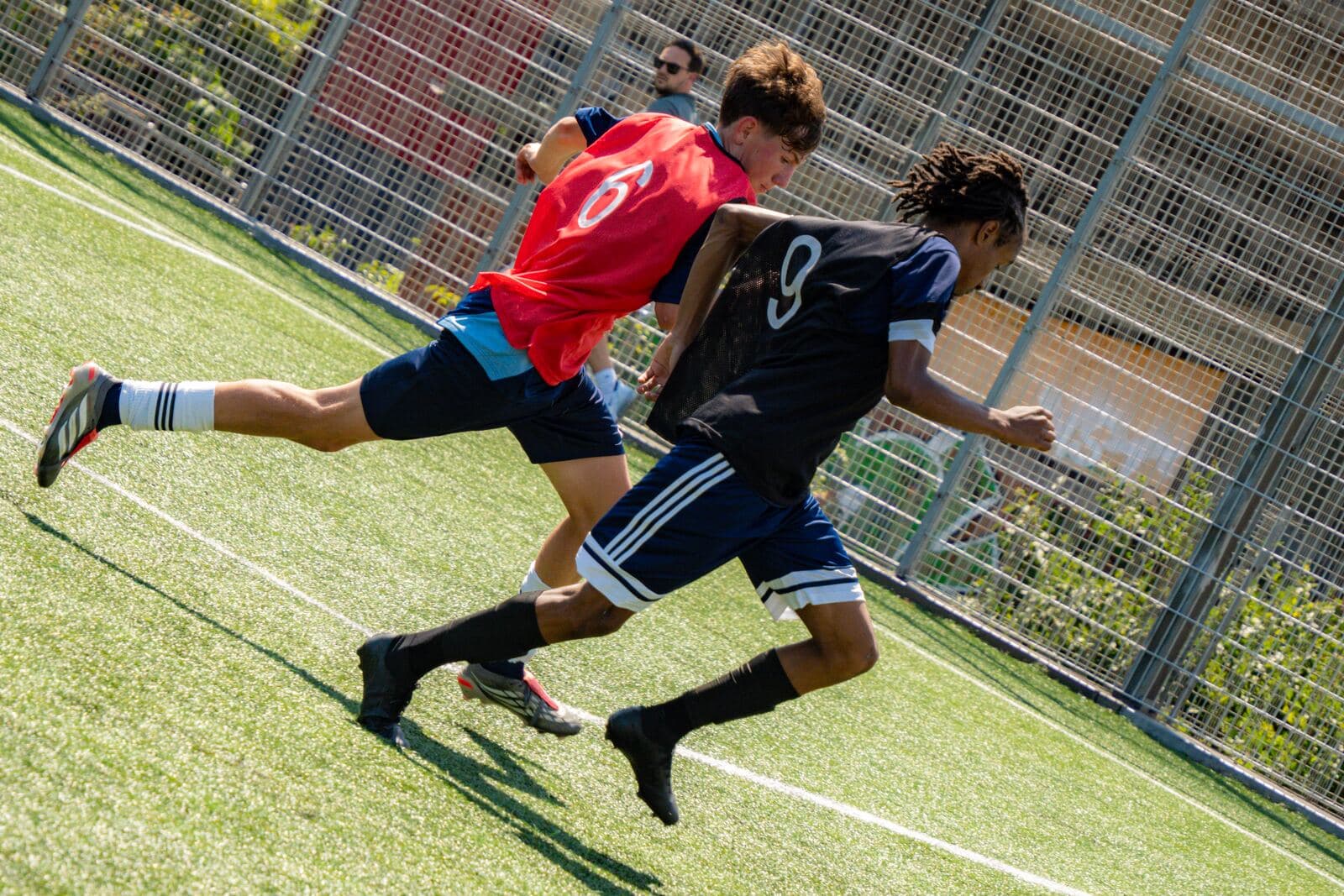 Players sprinting across the Westway pitch