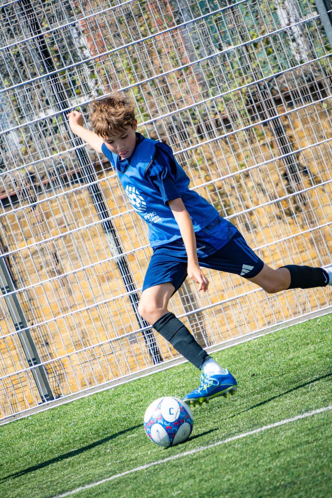 An E-PPRO player striking the ball at Westway